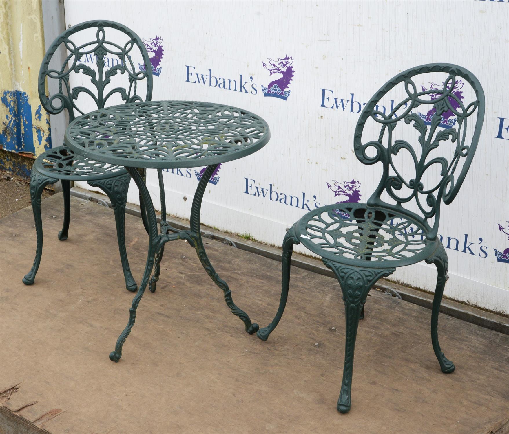 A modern Victorian style green painted metal foliate pierced garden table, on a triform base, - Image 2 of 3