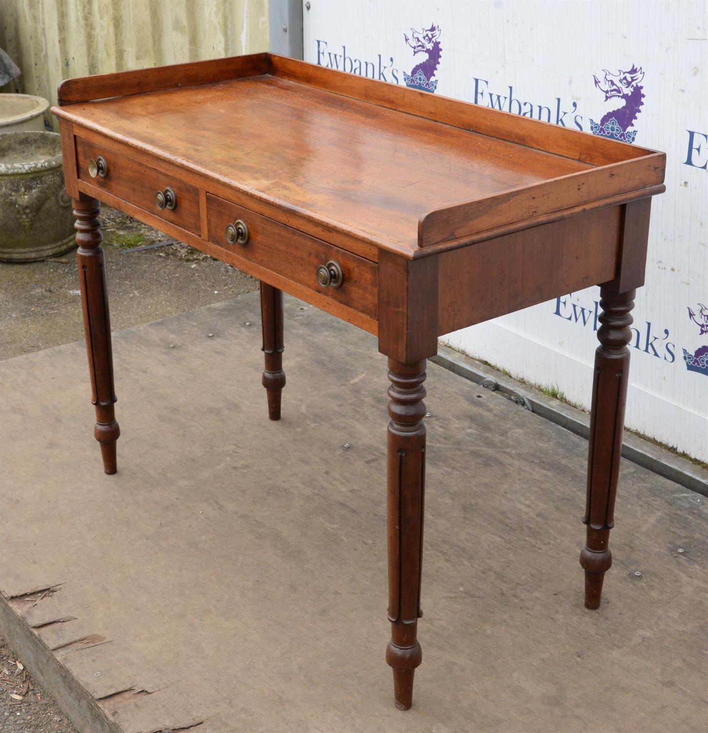 A Victorian mahogany side table, 1840s, the three quarter gallery top above two drawers, - Image 2 of 3