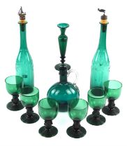 Pair of Victorian green glass decanters, with associated cork and silver plated stoppers, 31.