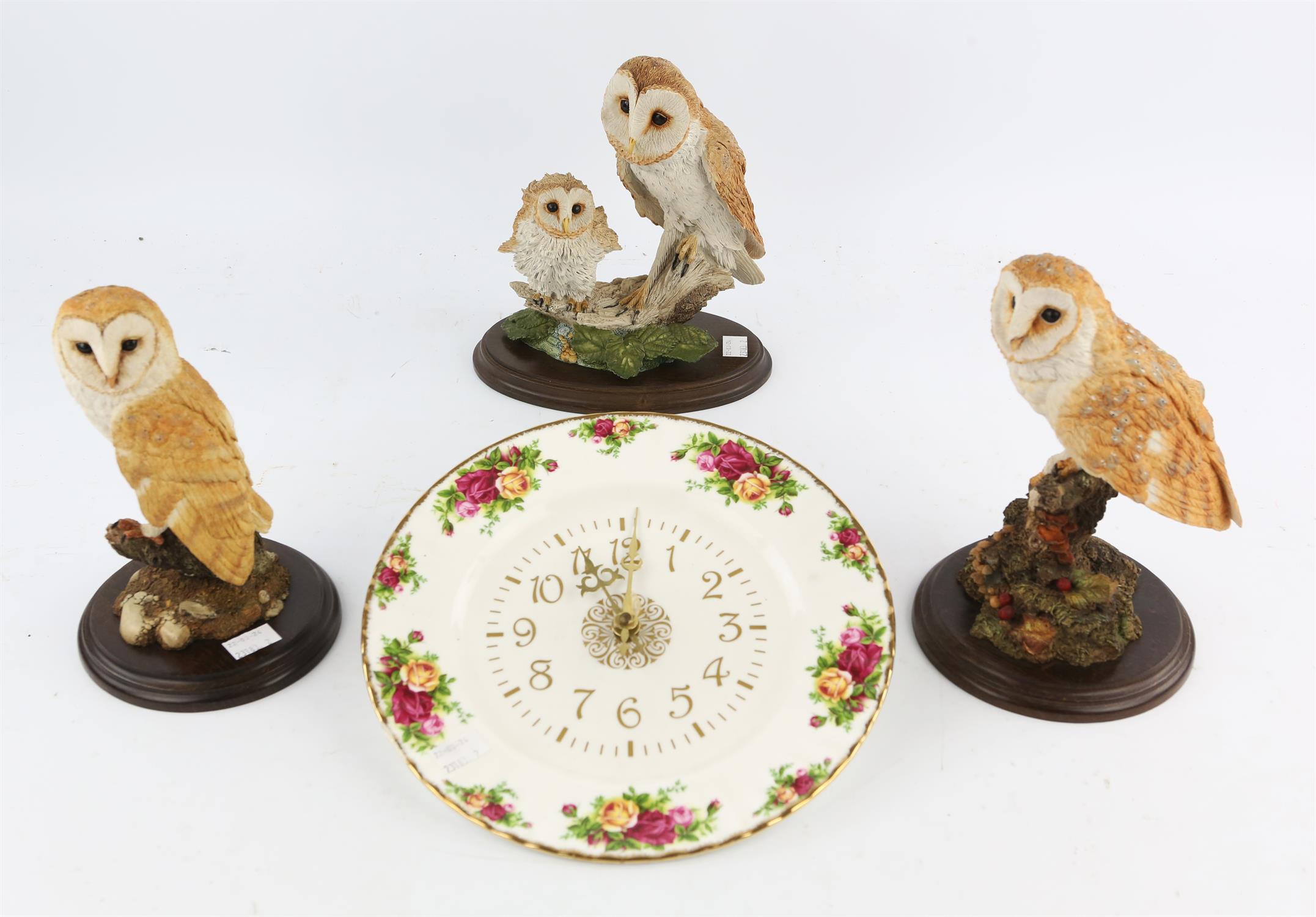 Three porcelain owl groups by Country Artists, the tallest 23cm and a Royal Albert 'Old Country