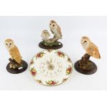 Three porcelain owl groups by Country Artists, the tallest 23cm and a Royal Albert 'Old Country