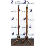 Pair of mahogany torchiere lamps, 18th Century or later, made from bedposts, with tripod bases,