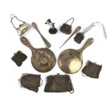 Collection of white metal and continental silver chain link purses, two hand mirrors,