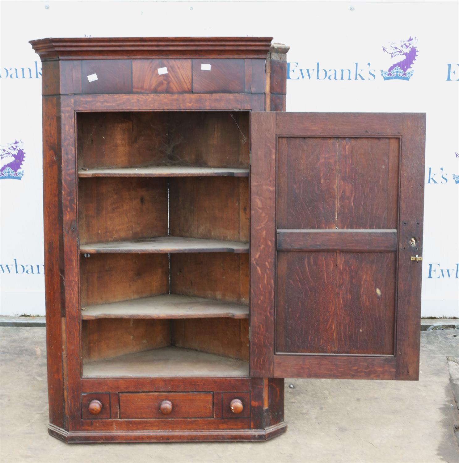 An 18th century Oak corner cupboard, single door over single drawer flanked by faux drawers. - Image 2 of 2