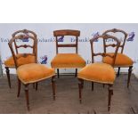 A set of four late Victorian rosewood salon chairs, inlaid with stringing, on fluted legs,