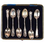 Cased set of silver spoons with ornate pattern, Sheffield, 1907, 93gms