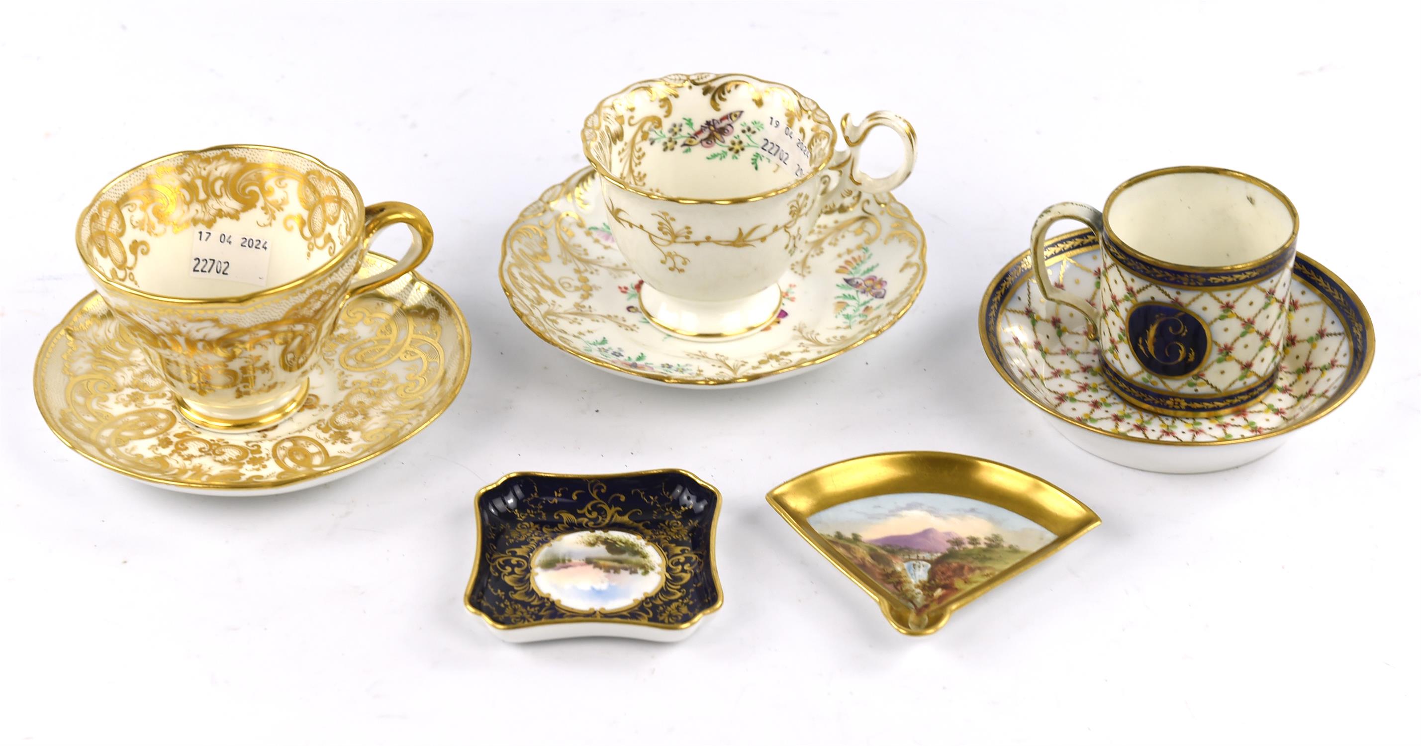 A late 18th/early 19th century Paris porcelain cabinet cup and saucer, gilt and foliate decorated
