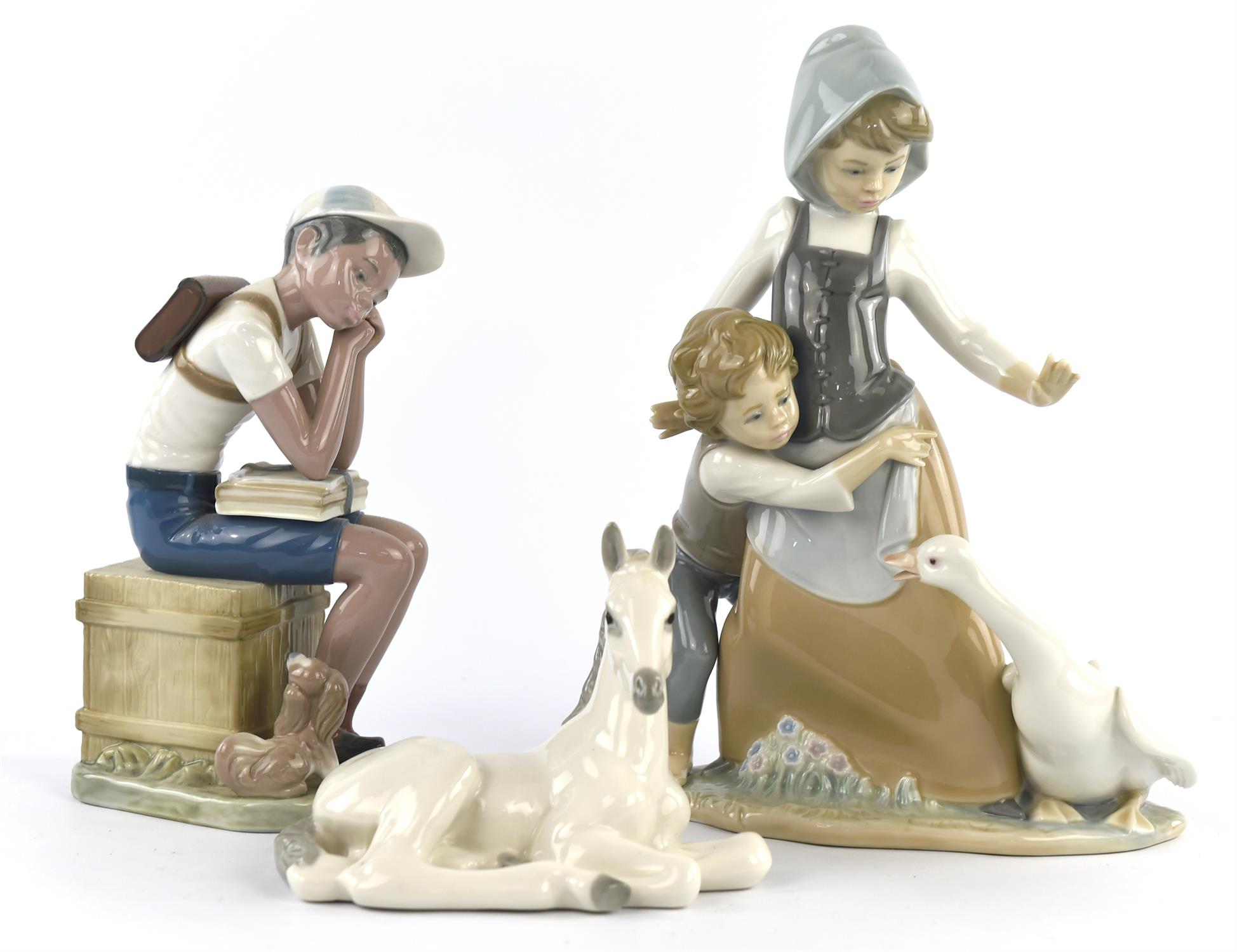 Ten Lladro porcelain figure groups including ; ' Avoiding the Goose', 'Sweet Dreams',