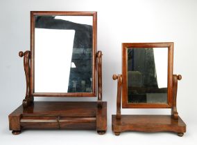 A William IV mahogany dressing table mirror, adjustable and on S-scroll supports,