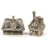 Two Rhodium silver plated model cottages. Impressed mark to base. Height 6cm. (2)