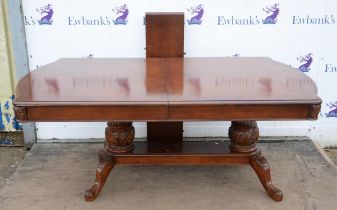 A Victorian style mahogany extending dining table, last quarter 20th century, the quarter veneered