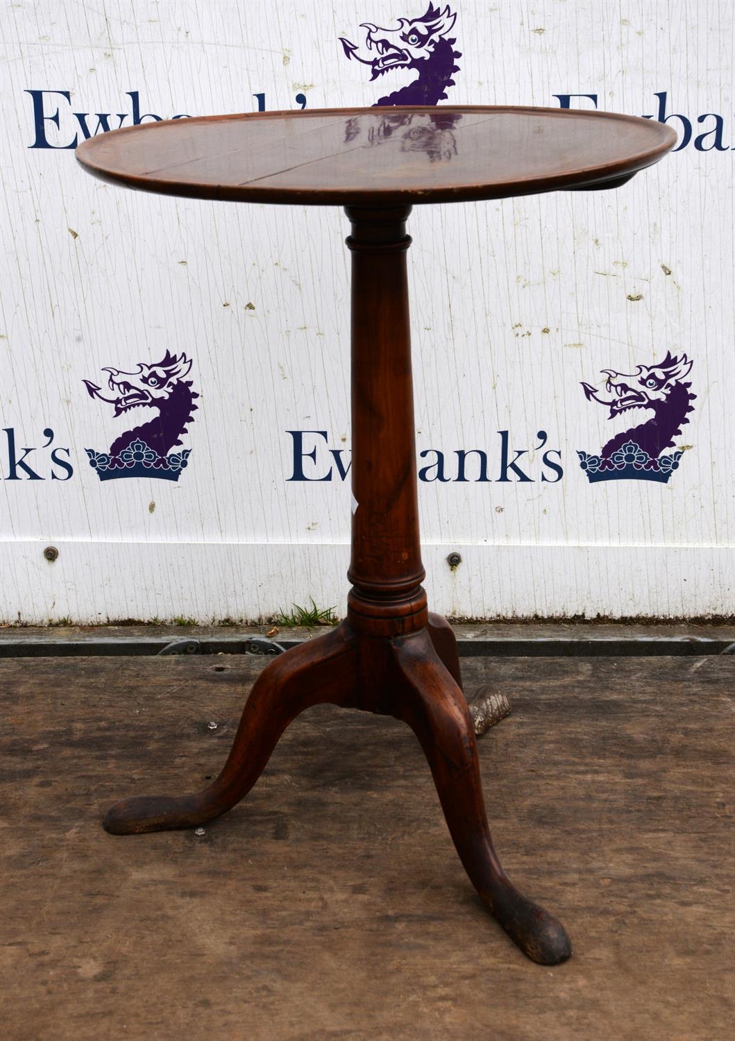 A George II tripod table, top and base associated, top mahogany and base fruitwood, H 69cm, diam.