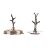 Two silver ring trees