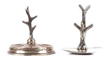 Two silver ring trees