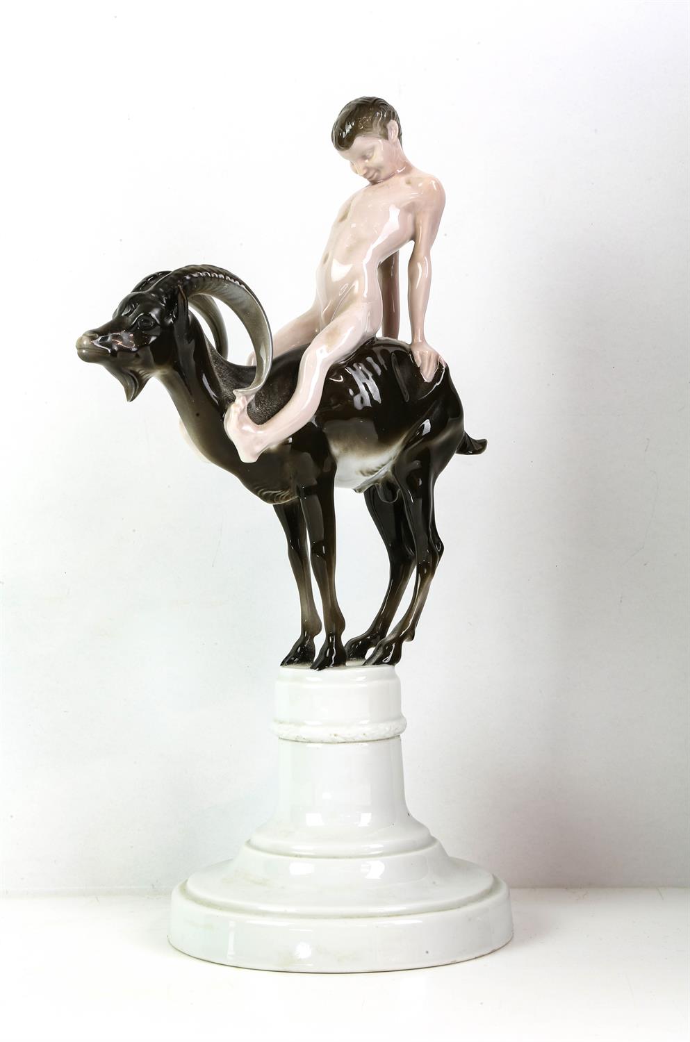 Ferdinand Liebermann (German, 1883-1941) for Rosenthal, a porcelain model of a boy and goat,