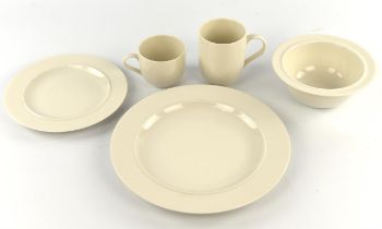 Ettore Sottass for Alessi, a white pottery part dinner service to comprise six white mugs,