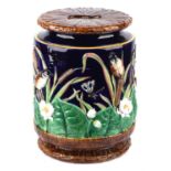 A George Jones majolica barrel form garden seat, moulded with a frieze of birds and lotus flowers,