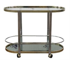 Unknown Designer, a chromed metal bar trolley, with glass top, above mirrored base, on casters,