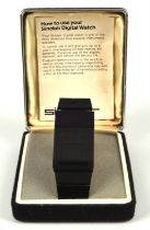 Sinclair Radionics, a black Sinclair watch, in case, with instruction book