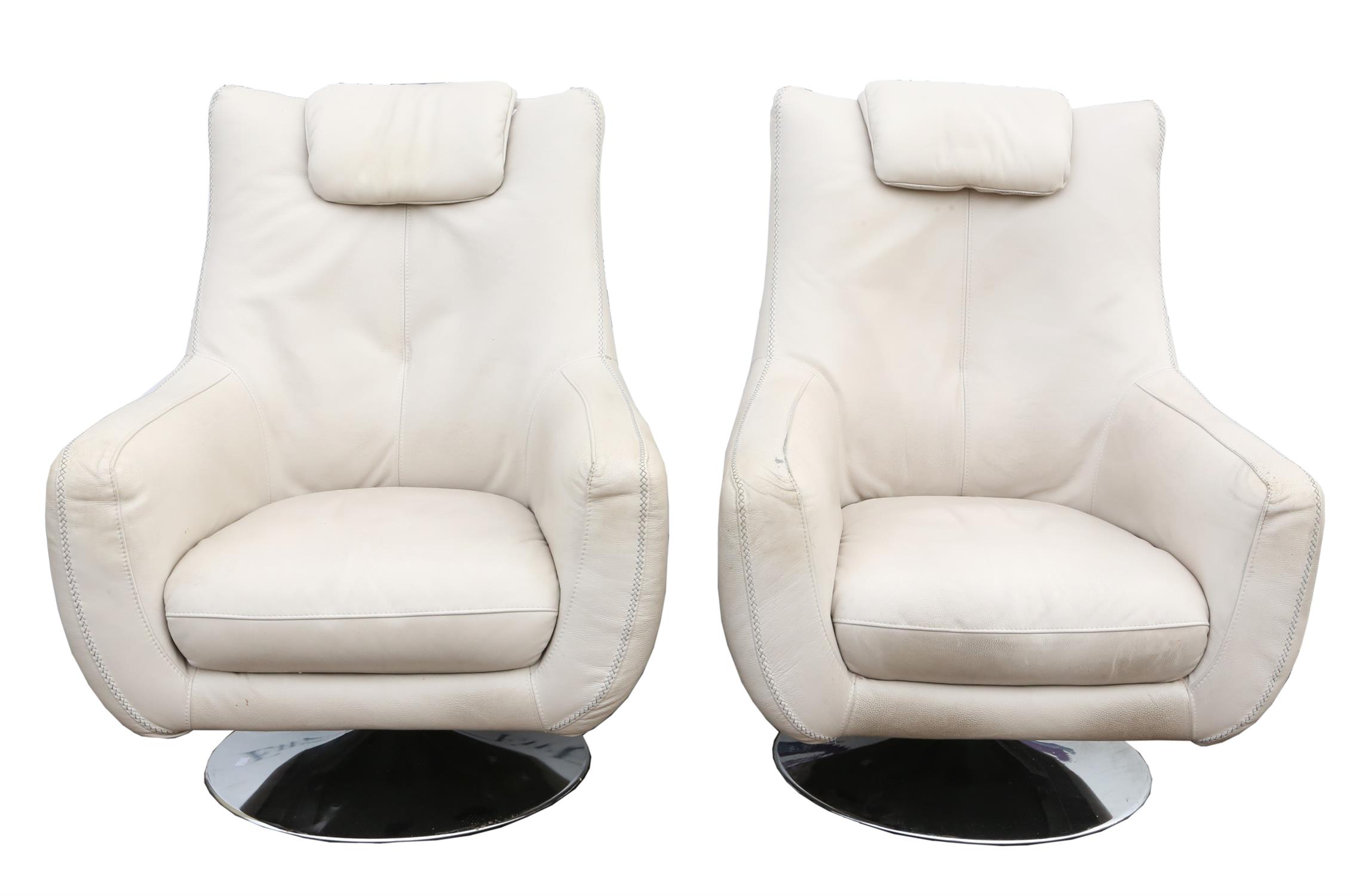 Unknown Designer, pair of cream leather upholstered swivel armchairs, on chromed metal bases, - Image 3 of 4