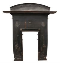 Art Nouveau style cast iron fire surround, with a shelf and stylised tulip motifs,