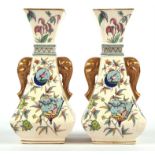 Christopher Dresser (British, 1834-1904), pair of printed and painted vases, with elephant head