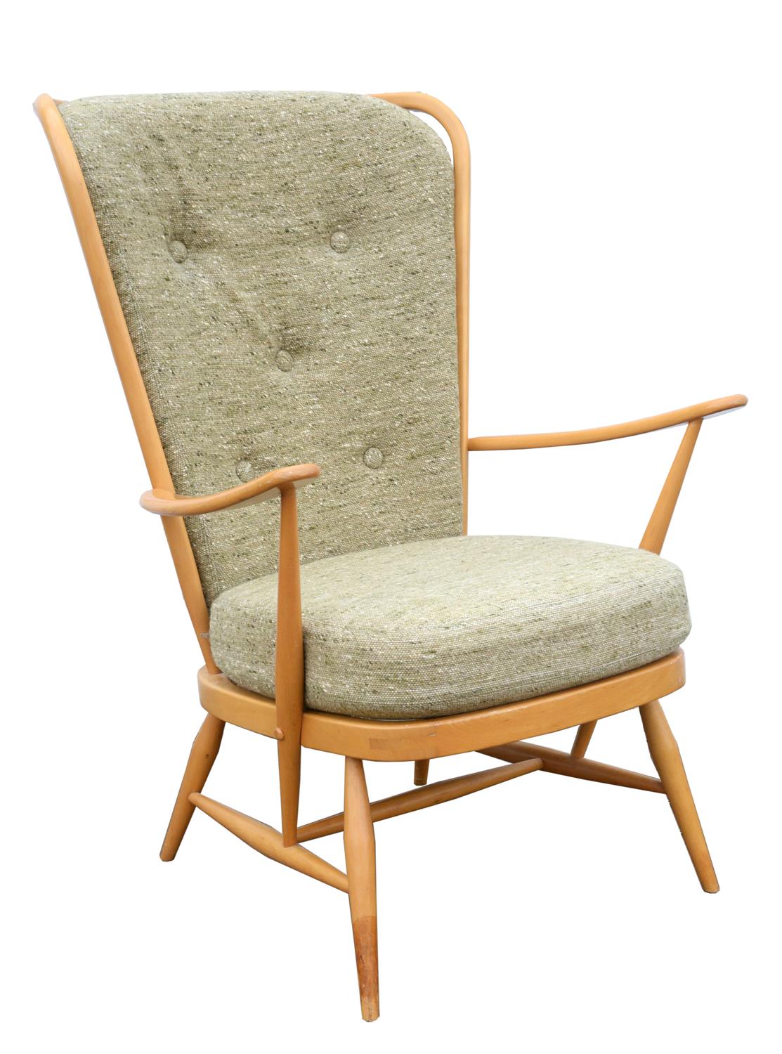 Ercol, a beechwood armchair, with two cushions, one with button back upholstery, 104cm high