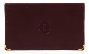 CARTIER burgundy bifold coat wallet with gold coloured hardware unused and unboxed (8cm x11cm)