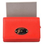 AMMENDED DESCRIPTION * MULBERRY boxed red leather bi-fold purse with brass hardware.