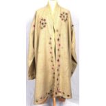 An antique Afghan soft wool KUSAI coat with decorative embroidery and very long sleeves and velvet