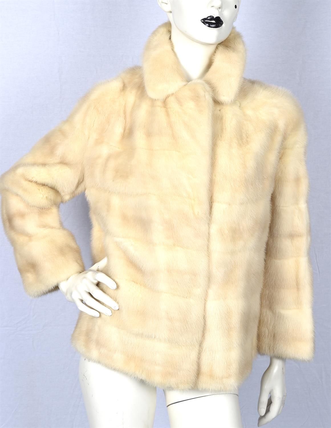 A 1950s PEARL MINK horizontal-strip short jacket by K. West of London. Fits UK12-14
