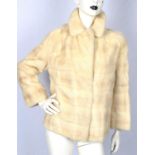 A 1950s PEARL MINK horizontal-strip short jacket by K. West of London. Fits UK12-14