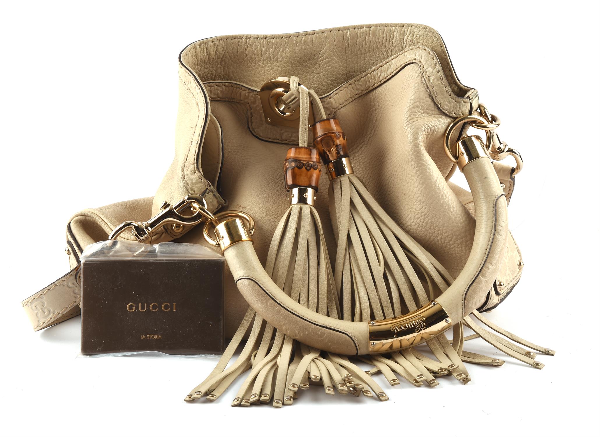 ADDENDUM LOT * GUCCI Jackie stone leather handbag with gold coloured hardware.(38cm x33cm x 3cm)