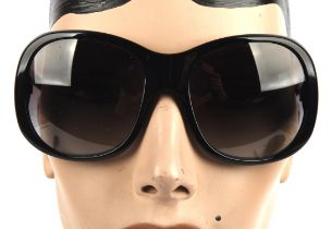 PRADA a pair of ladies sunglasses in a black PRADA case