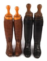 Two pairs of Gentleman's vintage riding boots with wooden trees