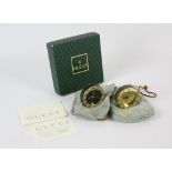 GUCCI two boxed his and hers leather-bound world travel/desk clocks in original kid leather pouches