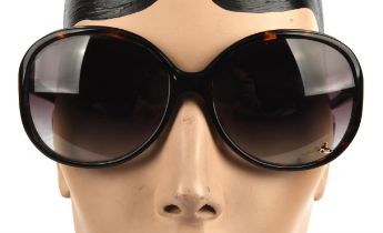 VIVIENNE WESTWOOD a pair of ladies sunglasses in a Yoma red zipped case