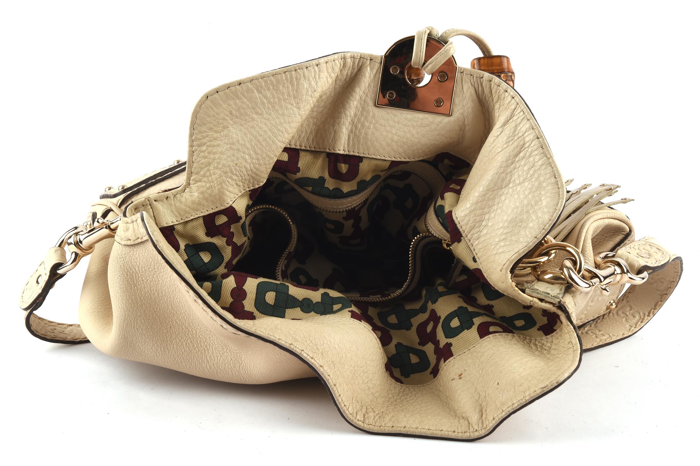 ADDENDUM LOT * GUCCI Jackie stone leather handbag with gold coloured hardware.(38cm x33cm x 3cm) - Image 3 of 3
