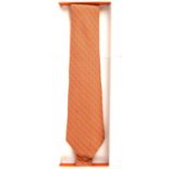 HERMES boxed orange silk tie