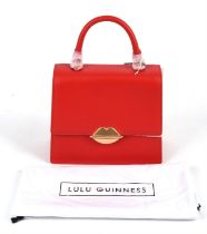 LULU GUINNESS lipstick red leather and suede framed handbag with long strap, dust bag and paperwork.