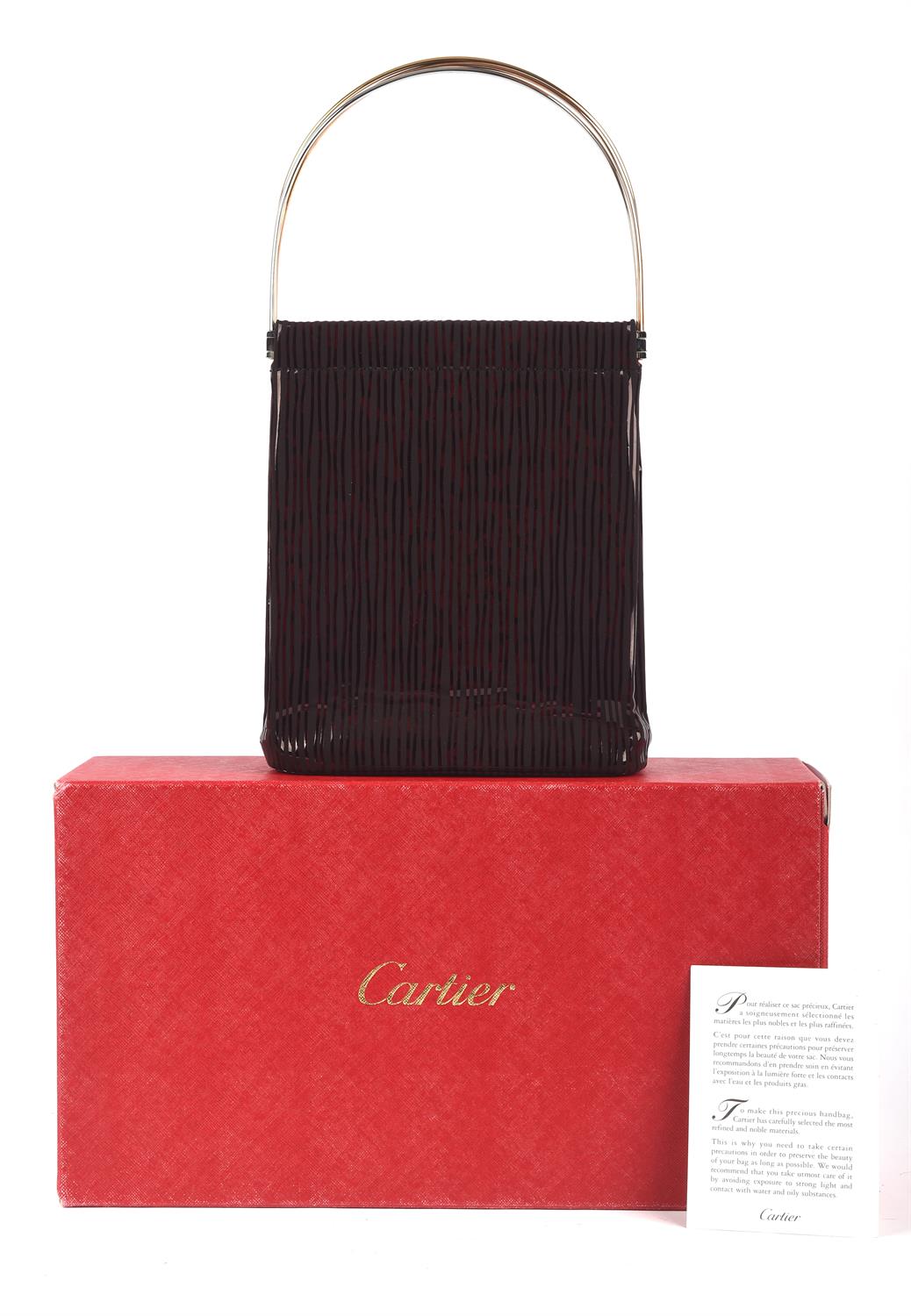 CARTIER MUST DE CARTIER boxed structured black and shimmering red handbag with gold, - Image 7 of 7
