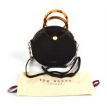 TED BAKER round black grained leather cross body handbag with brown Perspex tortoiseshell coloured