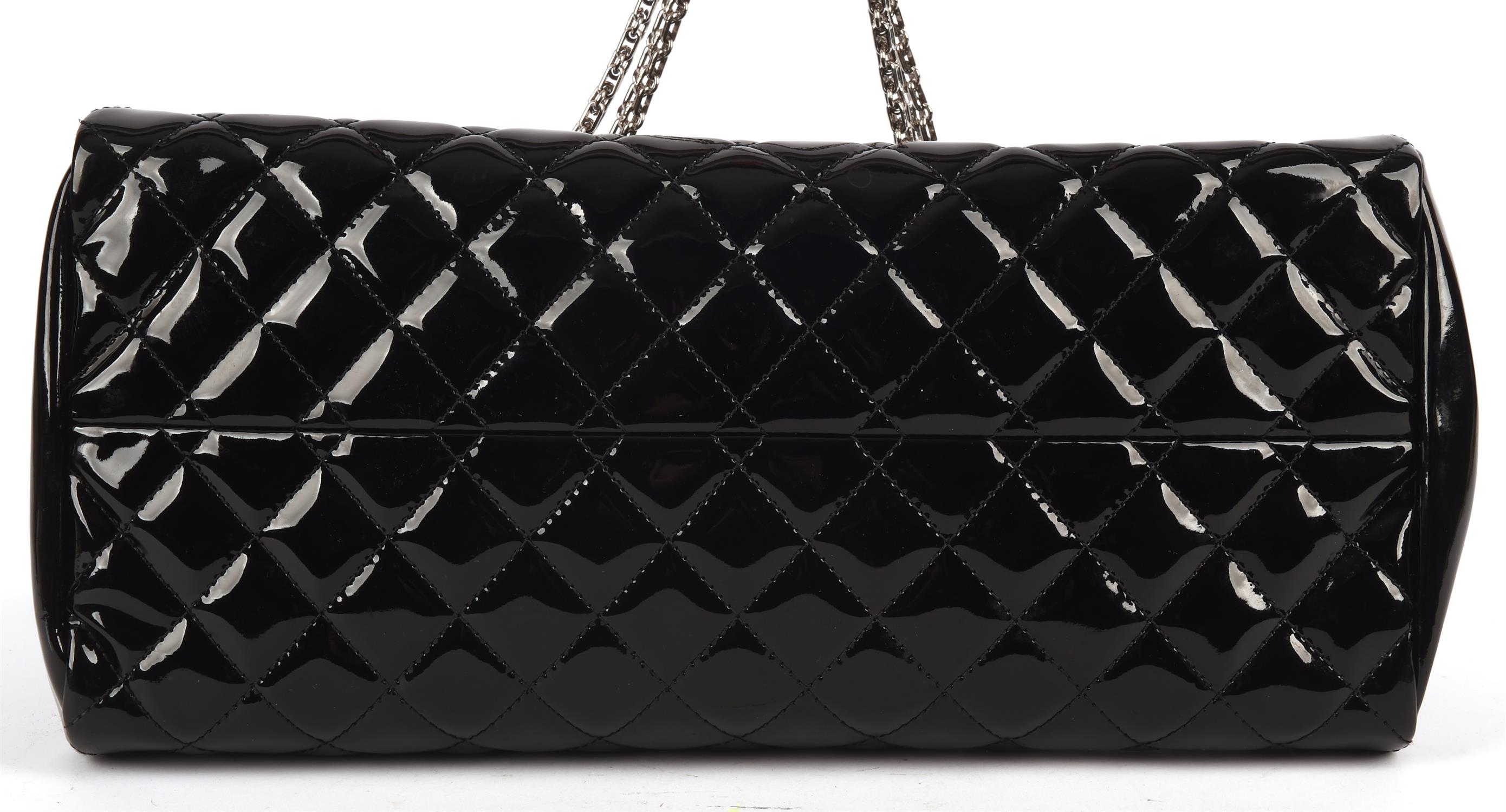 CHANEL quilted black patent Mademoiselle handbag with silver hardware and burgundy canvas interior. - Image 6 of 8
