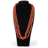 CORAL Edwardian triple strand necklace with silver clasp (35cm drop with clasp fastened.)