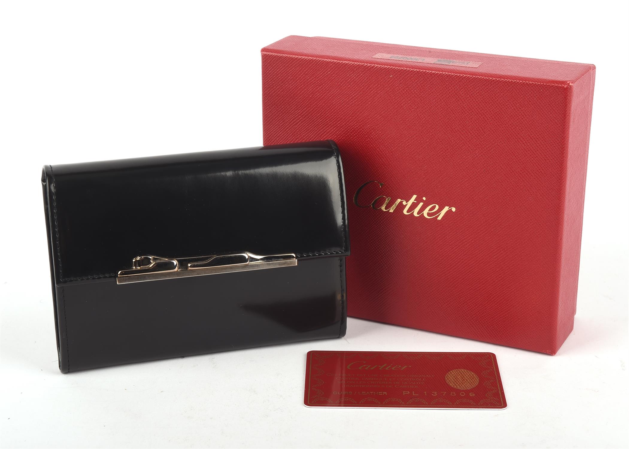 CARTIER MUST DE CARTIER boxed black smooth leather purse with six card sections and zipped