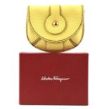 SALVATORRE FERRAGAMO boxed 1990s yellow leather coin purse with card. Unused