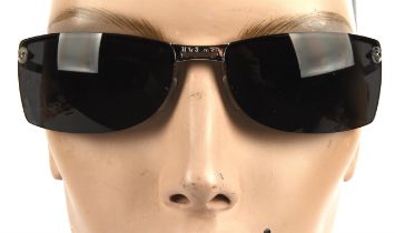 CHRISTIAN DIOR a pair of ladies sunglasses in a Kors brown hard case