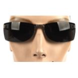 CHRISTIAN DIOR a pair of ladies sunglasses in a Kors brown hard case