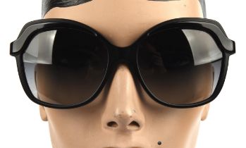 CHANEL a pair of ladies sunglasses in a black quilted case