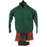 A child's good quality-vintage 1950s red tartan kilt with leather trims, leather sporran,